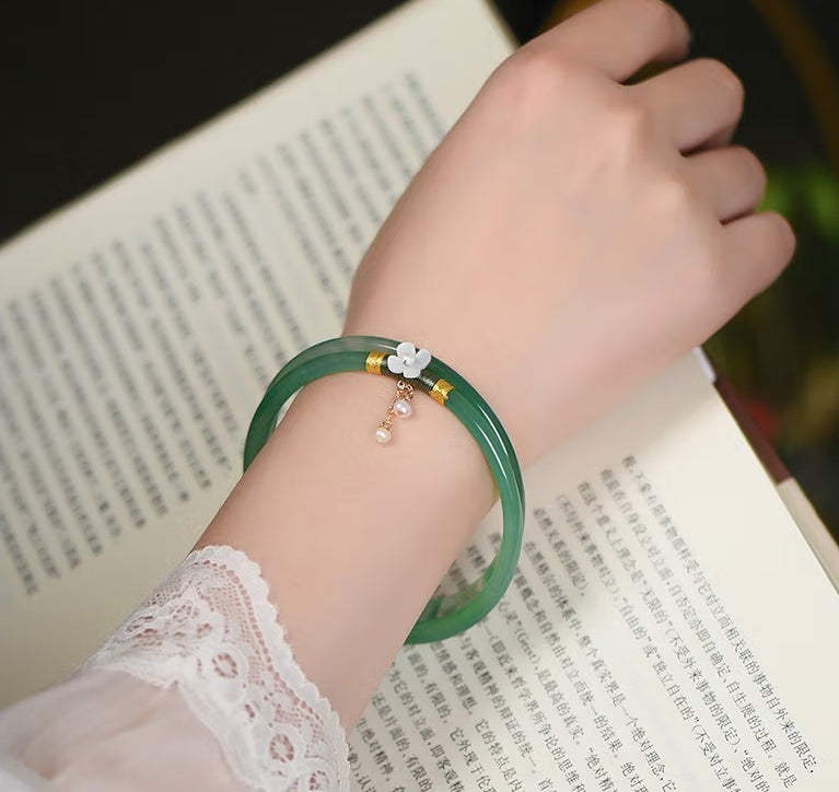 High Standard Hetian Jade Clanging Bracelet Bangle with Fairy Flower Pearl Double Circle Green Jade Bracelet for Women, featuring a niche design with an antique style. Includes two green pairs perfect birthday or Valentine's Day gift for her.