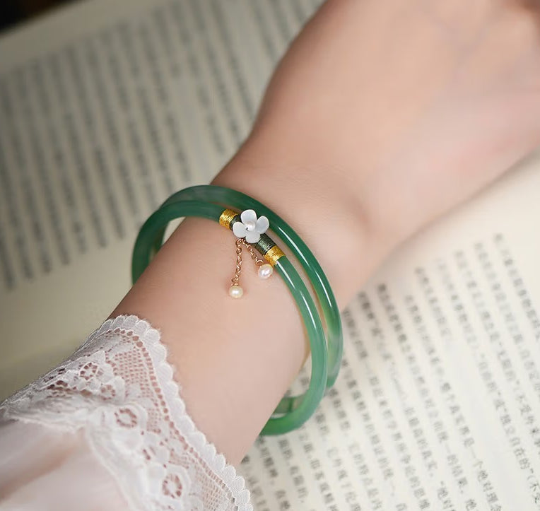 High Standard Hetian Jade Clanging Bracelet Bangle with Fairy Flower Pearl Double Circle Green Jade Bracelet for Women, featuring a niche design with an antique style. Includes two green pairs perfect birthday or Valentine's Day gift for her.